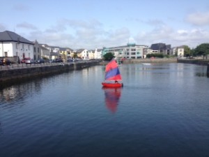 Our first Optimist sails in the Claddagh Basin helmed by Sean Oliver. 
